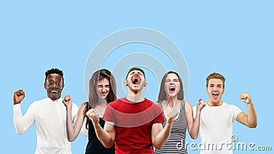 Portrait of multiethnic group of young people isolated on blue studio background, flyer, collage Stock Photo