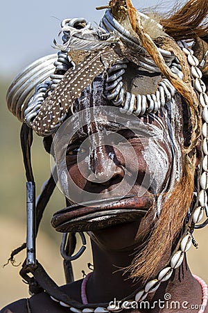 Portrait of a Mursi woman in Ethiopia Editorial Stock Photo