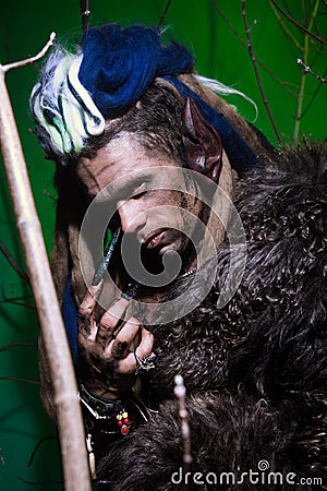 Portrait muscular werewolf with dreadlocks with long nails among Stock Photo