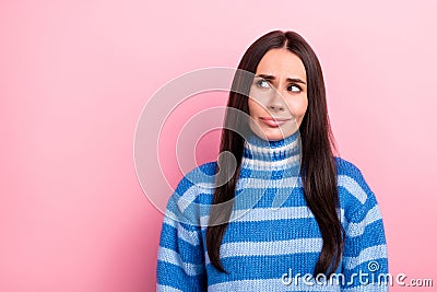 Portrait of nice minded young lady look interested empty space hesitate contemplate isolated on pink color background Stock Photo