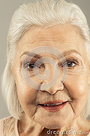 Portrait of a nice pleasant old woman Stock Photo