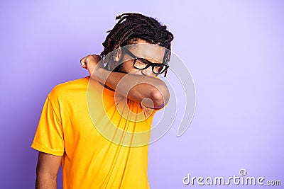 Portrait of nice sick brunet guy sneeze wear spectacles orange t-shirt on vibrant lilac color background Stock Photo