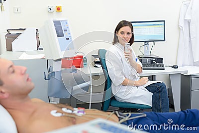 portrait nurse recording observation Stock Photo