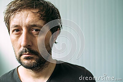 Portrait od miserable and tired adult man Stock Photo