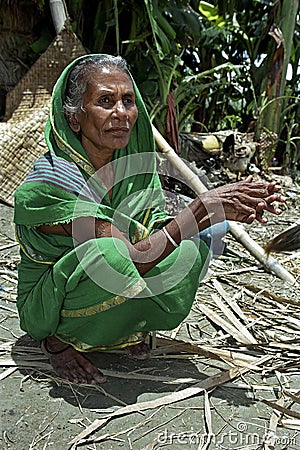 Portrait of old woman in traditional dress Editorial Stock Photo