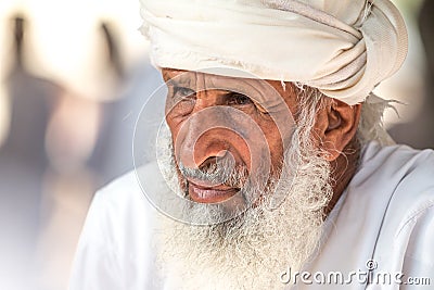 Portrait of an Omani man in a traditional Omani dress. Nizwa, Oman - 15/OCT/2016 Editorial Stock Photo