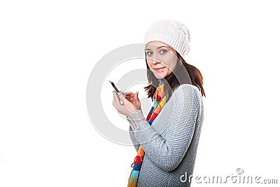 Portrait of one person sending a message by mobile phone on isolated background Stock Photo