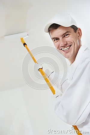 Happy house painter worker Stock Photo