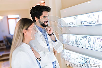 Portrait of ophthalmologists, who makes eye-ophthalmological viewing for a client Stock Photo