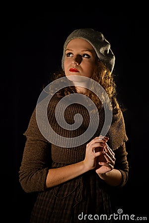 Portrait of parisian,self-assured,serious,confident,proud,high-minded girl with red lips and grey beret,brown dress.Vintage style Stock Photo