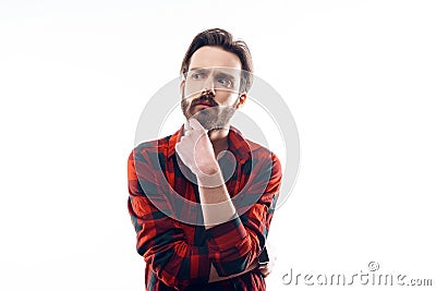 Portrait of Pensive Handsome Man Looking Away Stock Photo