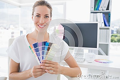 Portrait of a photo editor holding colors Stock Photo