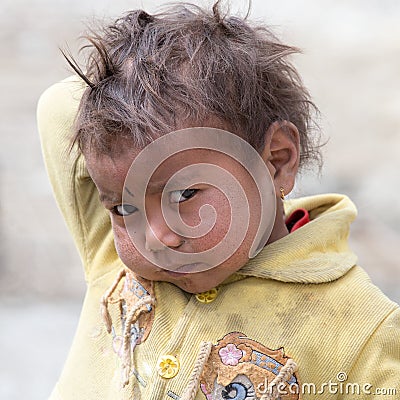 Portrait poor young boy in India Editorial Stock Photo