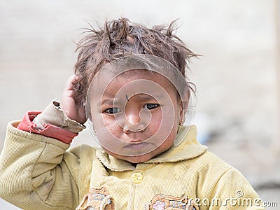 Portrait poor young boy in India Editorial Stock Photo