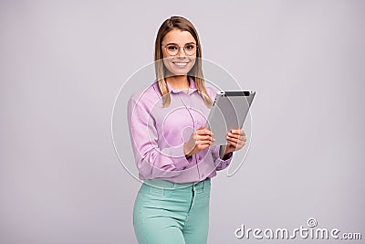 Portrait of positive cheerful independent expert girl ready for start up development presentation hold tablet wear good Stock Photo