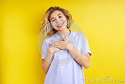 portrait of positive female expressing gratitude Stock Photo