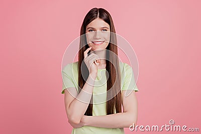 Portrait of positive minded girl happy smile touch chin finger think thoughts isolated over pastel color background Stock Photo