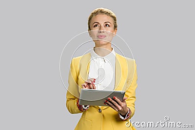 Portrait of positive thoughtful female manager. Stock Photo