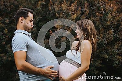 Portrait of pregnant wife and pregnant husband Stock Photo