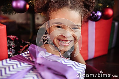 Portrait of a preschool child girl laying down. Studio shot Stock Photo