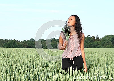 Portrait of pretty girl in field with wheat Stock Photo