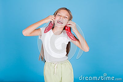 Portrait of a pretty girl with a red pepper fresh vegetables Stock Photo