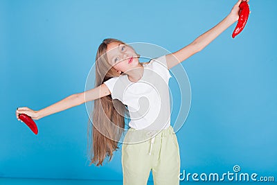 Portrait of a pretty girl with a red pepper fresh vegetables Stock Photo