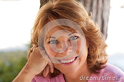 Portrait of pretty, middle-aged woman Stock Photo