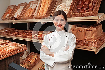 Portrait of professional baker near showcase Stock Photo