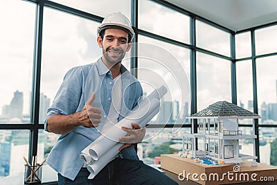 Portrait of professional engineer thinking about modern house project. Tracery. Stock Photo