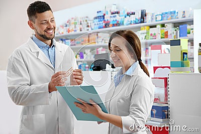 Portrait of professional pharmacists in drugstore Stock Photo