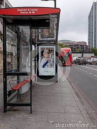 Portrait of the Queen Elizabeth II on the bust stop in London on the next day after she passed away Editorial Stock Photo