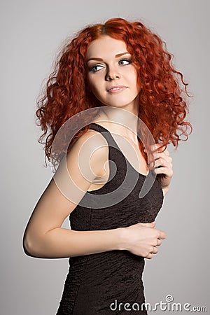 Portrait red haired young woman Stock Photo