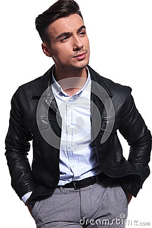 Portrait of relaxed businessman in leather jacket looking to side Stock Photo