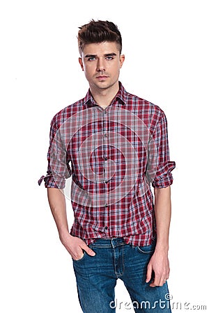 Portrait of relaxed young man wearing a shirt with plaids Stock Photo
