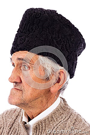 Portrait of a romanian old peasant with old fashion Astrakhan ha Stock Photo