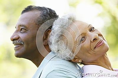 Portrait Of Romantic Senior African American Couple In Park Stock Photo