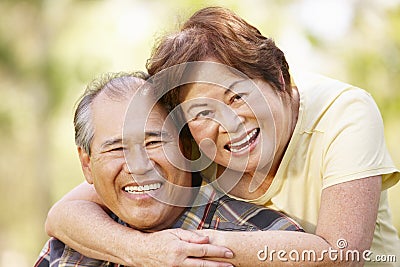 Portrait romantic senior Asian couple outdoors Stock Photo