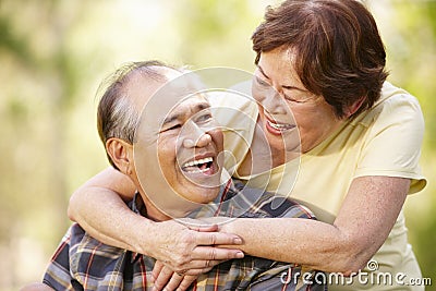 Portrait romantic senior Asian couple outdoors Stock Photo