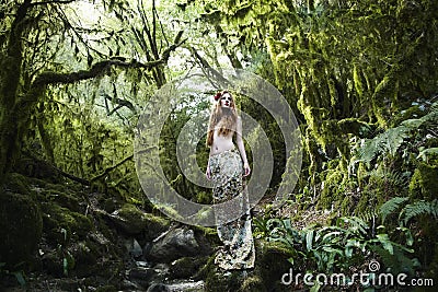 Portrait of romantic woman in fairy forest Stock Photo