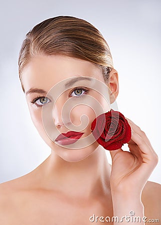 Portrait, rose and woman with skincare, dermatology and beauty on a white studio background. Face, person and model with Stock Photo