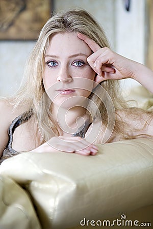 Portrait of sad blond lonely teen girl Stock Photo