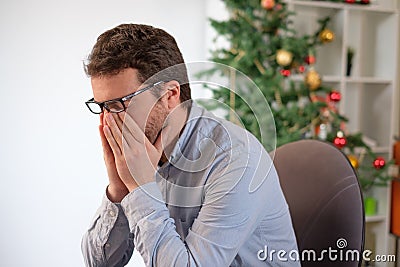 Portrait of sad office collar worker during christmas holiday ti Stock Photo