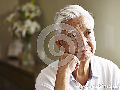 Portrait of a sad senior asian man Stock Photo