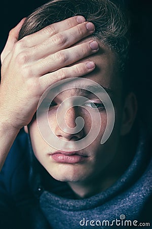 Portrait of a sad, tired, depressed teenager. Problems of teenagers, concept. Stock Photo