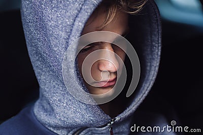 Portrait of a sad, tired, depressed teenager. Problems of teenagers, concept. Stock Photo