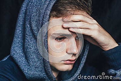 Portrait of a sad, tired, depressed teenager. Problems of teenagers, concept. Stock Photo