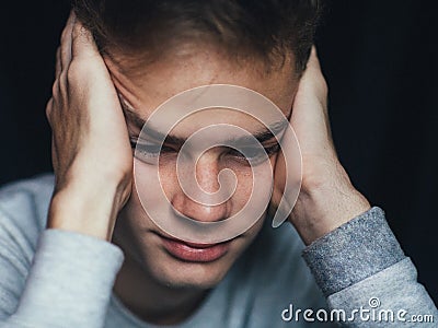 Portrait of a sad, tired, depressed teenager. Problems of teenagers, concept. Stock Photo