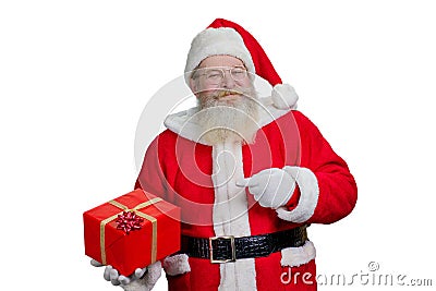 Portrait of Santa Claus with present. Stock Photo