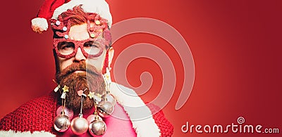 Portrait of a Santa Claus on red background isolated, banner. Modern Portrait of a Santa Claus. Stock Photo